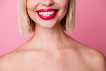 Cropped photo of cheerful good mood girl naked shoulders smiling showing white teeth isolated pink color background