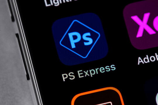 Adobe Photoshop (PS Express) mobile icon app on a screen smartphone iPhone. Adobe Systems Incorporated is an American multinational computer software company. Batumi, Georgia - November 5, 2023