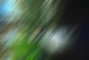 Motion Blurr background, Abstract image with blurred diagonal lines in predominantly green, blue, and white colors on a dark background