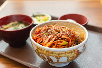 Beef rice bowl with kimchi, korean and japanese traditional fusion food style culture.