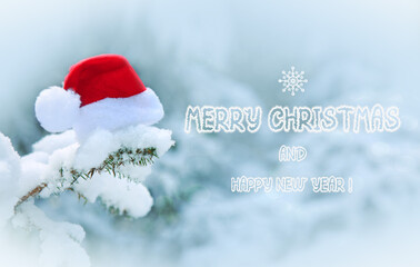 New Year background with Merry Christmas text and red Santa hat .