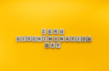 Fototapeta premium March 1, Zero Discrimination Day, a minimalistic banner with an inscription in wooden letters