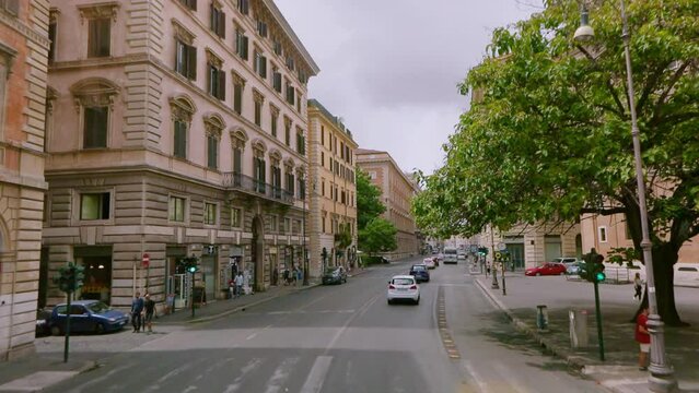 Streets of Rome view from the window of a car. Old streets of Rome. A trip by car through the streets of Rome. Driving around the city
