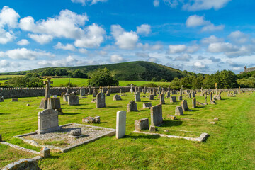 Gravestones in the God’s Acre Cemetery in the village of Corfe, Castle, UK