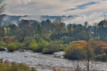 colorful autumnal landscape near the river, located in the triangle Bonn, Cologne and Siegen