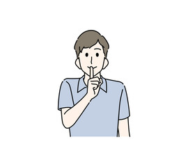 人差し指を口元にあてて、内緒、静かに、のポーズをする男性