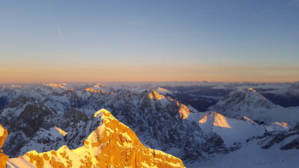 Alpenglow in the snow-capped Central Alps