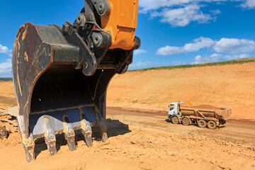  earthmoving excavator and truck, construction machinery,