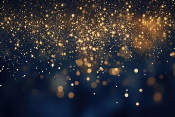 A dark blue background with a lot of gold sparkles. This image can be used for various purposes, such as adding a touch of glamour or creating a festive atmosphere.