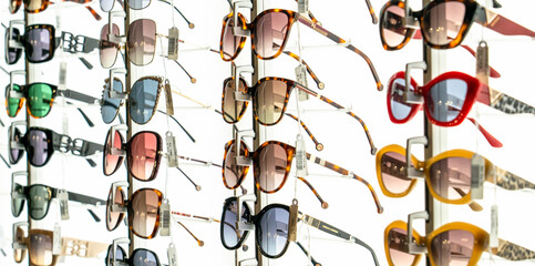 Salalalah, Oman -November 11.2023 :Display rack full of various sunglasses.