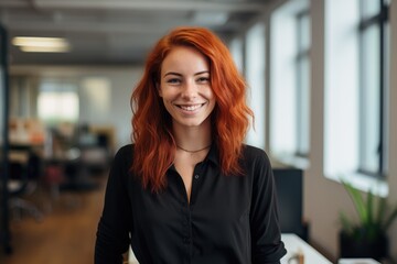Photo of a 25 year old German business woman smiling - obrazy, fototapety, plakaty