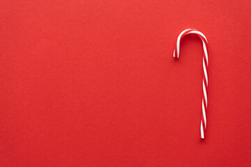 Candy cane or peppermint stick decoration for Christmas. Traditional red and white striped winter...