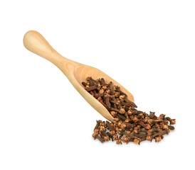 Dried cloves in the wooden spoon isolated on white background