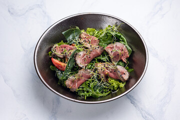 Delicious Salad with Meat and Arugula