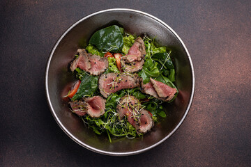 Delicious Salad with Meat and Arugula