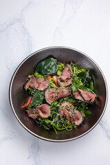 Delicious Salad with Meat and Arugula