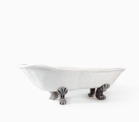 white vintage ceramic bathtub handmade on light background