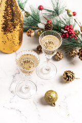 Champagne in glasses close-up, sparkles, Christmas, New Year, holiday