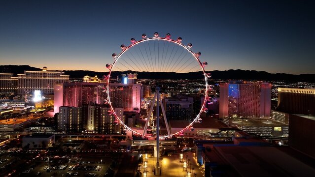 Ferris Wheel At Las Vegas In Nevada United States. Landmark Tourism Travel. Illuminated Las Vegas Skyline. Ferris Wheel At Las Vegas In Nevada United States. 