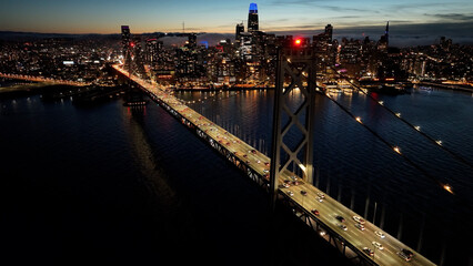 Sunset Oakland Bay Bridge At San Francisco In California United States. Highrise Building...