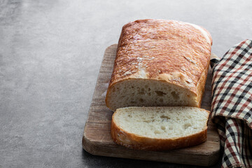 Ciabatta italian bread on gray background