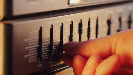 Retro fm am radio tape, music, technology, people and equipment concept - man using mixing console in sound recording studio