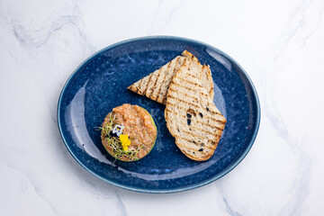 Fresh Tatar on a plate. Close-up