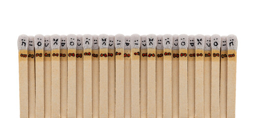 matchsticks with faces painted on the heads on white background