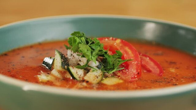 Tomato gazpacho Spanish cold soup with pepper and garlic, Spanish traditional cuisine, chef cooking dinner.