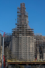 Paris, France - 11 30 2023: Notre Dame de Paris. Panoramic view of the renovation site with scaffolding and the new steeple.