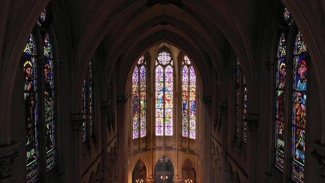Series of vibrant stained-glass telling sacred stories.