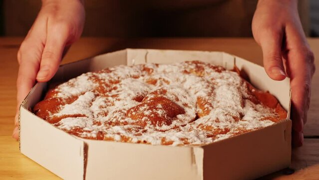 Ensaimada pie close up, a Spanish pastry typical of Mallorca, Majorca, Spain. Traditional dessert. 