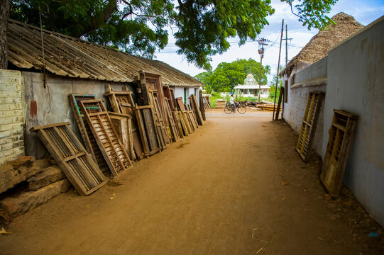 Street scene with a cyclist in India; Karaikudi, Chettinad, Tamil Nadu, India