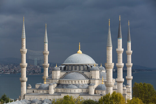 Close-up of the Blue Mosque (Sultan Ahmed Mosque) under a grey sky, ground breaking in 1609, UNESCO World Heritage Site; Istanbul, Turkey
