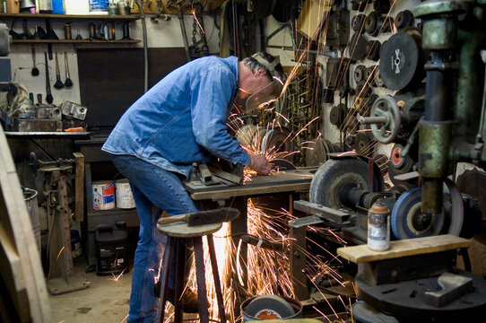 Man working in his workshop; Cortland, Nebraska, United States of America