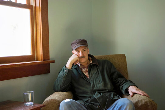 Man relaxing in his home; Lincoln, Nebraska, United States of America