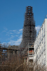 Paris, France - 11 30 2023: Notre Dame de Paris. Panoramic view of the renovation site with scaffolding and the new steeple.