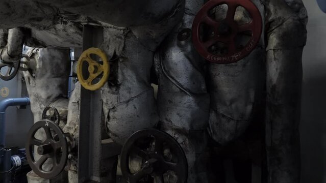 Valve hand wheels on steam pipeline