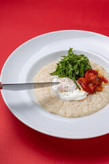 Breakfast - Oatmeal with poached egg and tomatoes