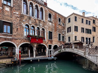 View of boats, canal and buildings. Selective focus