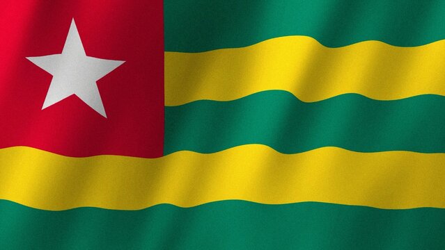 Togo flag waving in the wind. Flag of Togo images