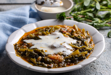 Traditional Turkish cuisine purslane dish with yoghurt (Turkish name; Yogurtlu semizotu yemegi)