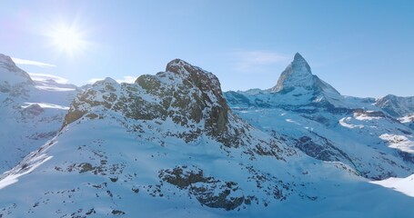 Fototapeta na wymiar Gornergrat with Matterhorn view during winter in Switzerland. Majestic mountain peaks iconic famous zermatt travel ski resort in the alps. Wonderful inspiring nature landscape.