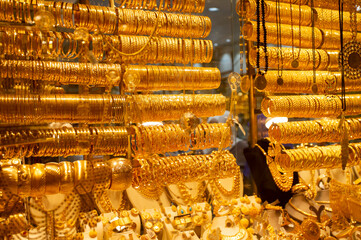 Glamorous golden bracelet selling in grand bazaar market.