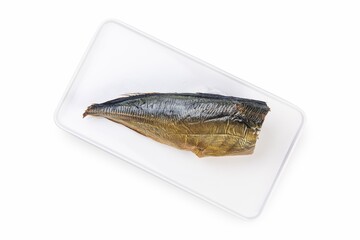 Smoked fish on a white plate from a fish shop
