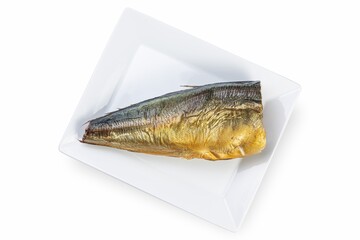 Smoked fish on a white plate from a fish shop