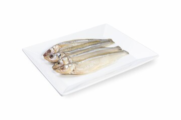 Smoked fish on a white plate from a fish shop