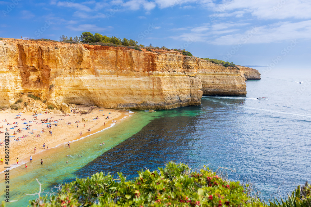 Wall mural Benagil beach in Algarve, Portugal, Europe. View of the beach in Benagil. Praia de Benagil beach on the Algarve, Portugal.