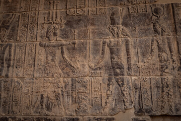 Fototapeta na wymiar Stone wall carving at Philae temple in Aswan Upper Egypt