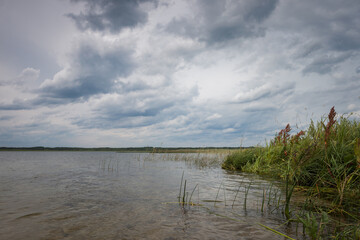 Lake in windy and cloudy weather.